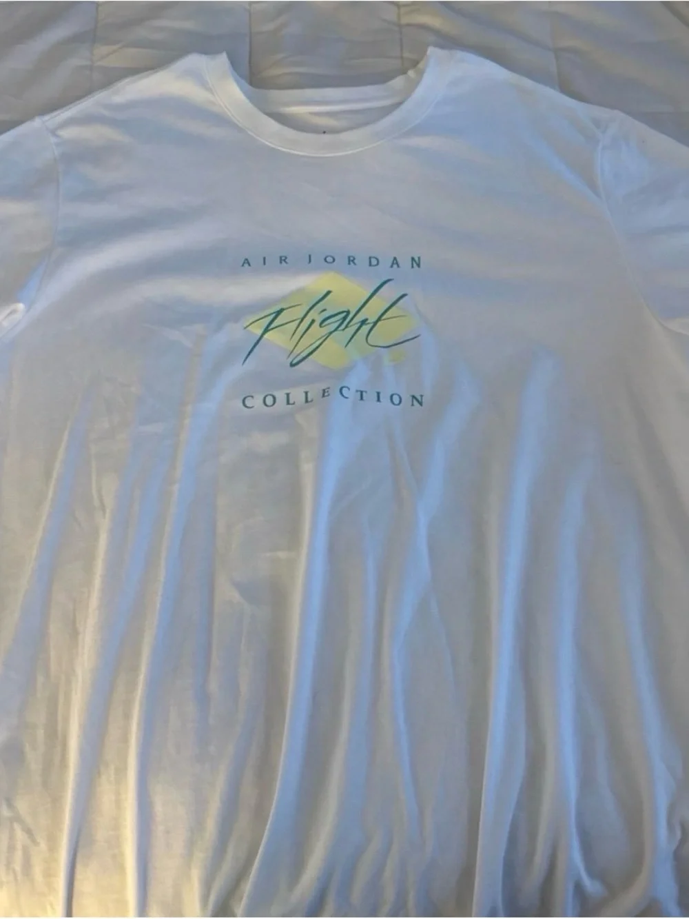 Jordan White Tee with Blue and Yellow Flight Graphic